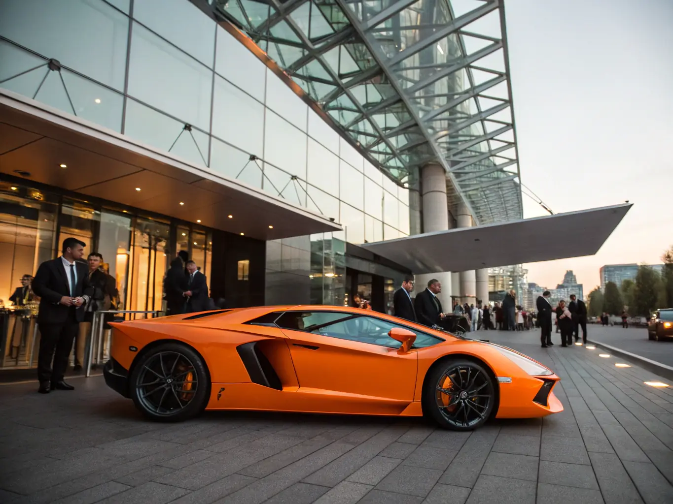 A sleek, modern exotic car parked in front of a luxury office building, symbolizing high-end leasing options.